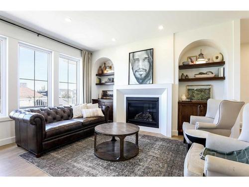 363 Church Avenue, Raymond, AB - Indoor Photo Showing Living Room With Fireplace