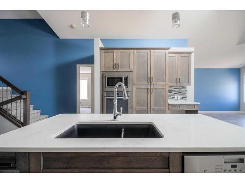 734 Greywolf Run North, Lethbridge, AB - Indoor Photo Showing Kitchen With Double Sink