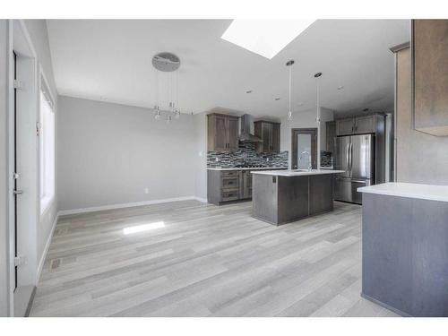 734 Greywolf Run North, Lethbridge, AB - Indoor Photo Showing Kitchen With Upgraded Kitchen