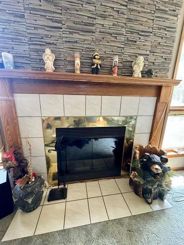 314 Stafford Bay North, Lethbridge, AB - Indoor Photo Showing Other Room With Fireplace