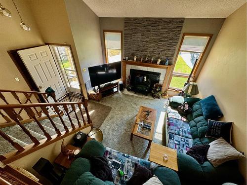 314 Stafford Bay North, Lethbridge, AB - Indoor Photo Showing Living Room With Fireplace