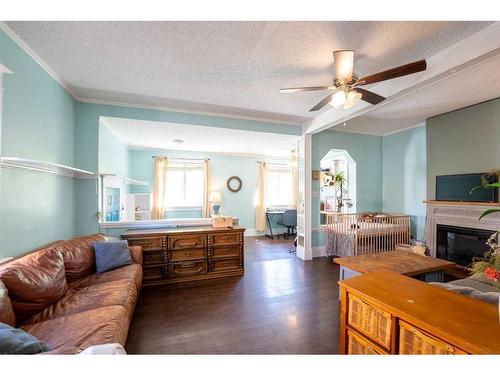 347 18 Street, Fort Macleod, AB - Indoor Photo Showing Living Room With Fireplace