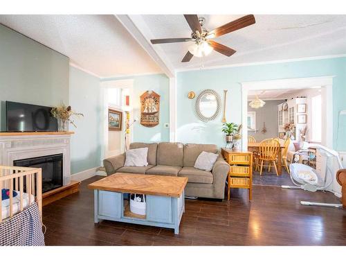 347 18 Street, Fort Macleod, AB - Indoor Photo Showing Living Room With Fireplace