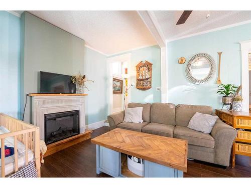 347 18 Street, Fort Macleod, AB - Indoor Photo Showing Living Room With Fireplace