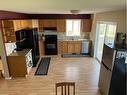 138 Peigan Court West, Lethbridge, AB  - Indoor Photo Showing Kitchen With Double Sink 