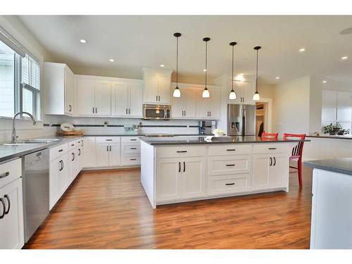 52 Cobblestone Lane, Raymond, AB - Indoor Photo Showing Kitchen With Upgraded Kitchen