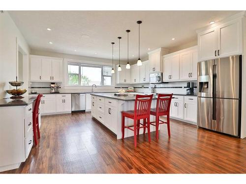 52 Cobblestone Lane, Raymond, AB - Indoor Photo Showing Kitchen With Upgraded Kitchen