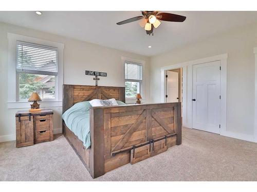 52 Cobblestone Lane, Raymond, AB - Indoor Photo Showing Bedroom