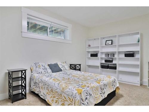 52 Cobblestone Lane, Raymond, AB - Indoor Photo Showing Bedroom