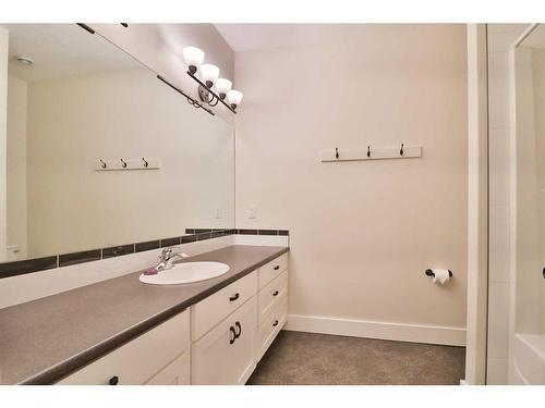 52 Cobblestone Lane, Raymond, AB - Indoor Photo Showing Bathroom