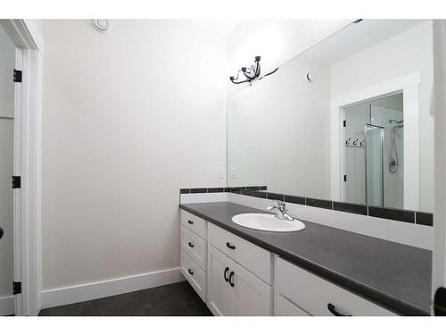 52 Cobblestone Lane, Raymond, AB - Indoor Photo Showing Bathroom