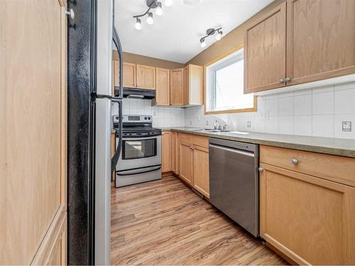 895 Kettles Street, Pincher Creek, AB - Indoor Photo Showing Kitchen With Double Sink