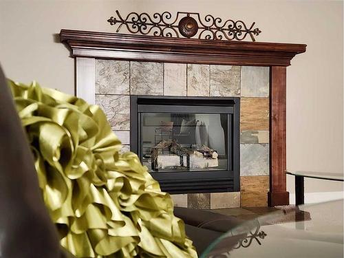 228 Southgate Boulevard South, Lethbridge, AB - Indoor With Fireplace