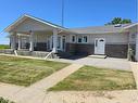 94065 Rr 211, Rural Lethbridge County, AB  - Outdoor With Deck Patio Veranda With Facade 