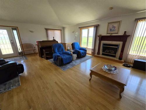 94065 Rr 211, Rural Lethbridge County, AB - Indoor Photo Showing Living Room With Fireplace