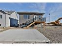 324 Aquitania Boulevard West, Lethbridge, AB  - Outdoor With Deck Patio Veranda With Exterior 