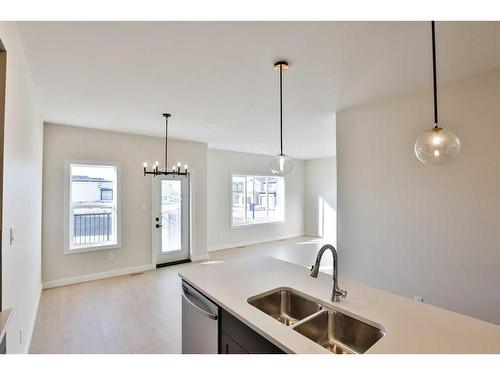 324 Aquitania Boulevard West, Lethbridge, AB - Indoor Photo Showing Kitchen With Double Sink