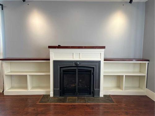 69E 1 Avenue South, Magrath, AB - Indoor With Fireplace