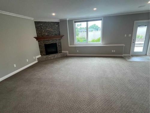 72 Sixmile Road South, Lethbridge, AB - Indoor With Fireplace