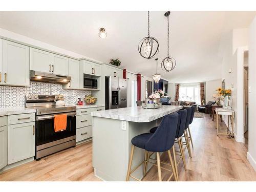 559 Margaret Sutherland Crescent North, Lethbridge, AB - Indoor Photo Showing Kitchen With Upgraded Kitchen
