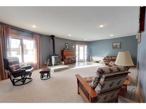 383066 And 383054 Range Road 7-3, Rural Clearwater County, AB - Indoor Photo Showing Living Room With Fireplace