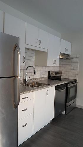 383066 And 383054 Range Road 7-3, Rural Clearwater County, AB - Indoor Photo Showing Kitchen With Double Sink