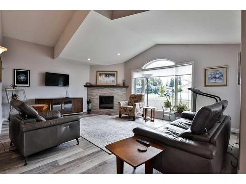 6 Fairmont Park South, Lethbridge, AB - Indoor Photo Showing Living Room With Fireplace