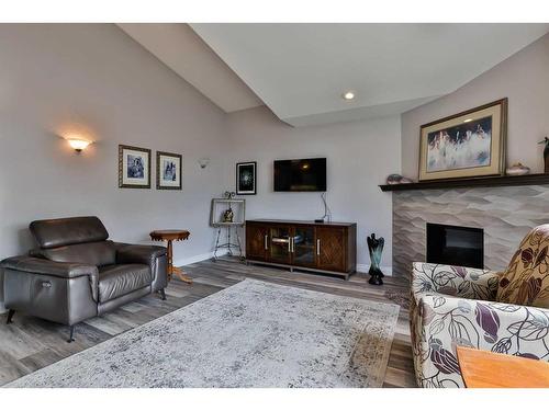 6 Fairmont Park South, Lethbridge, AB - Indoor Photo Showing Living Room With Fireplace