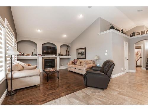 592 Sixmile Crescent South, Lethbridge, AB - Indoor Photo Showing Living Room With Fireplace