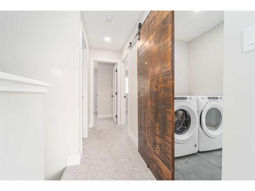 8601 24 Avenue, Coleman, AB - Indoor Photo Showing Laundry Room