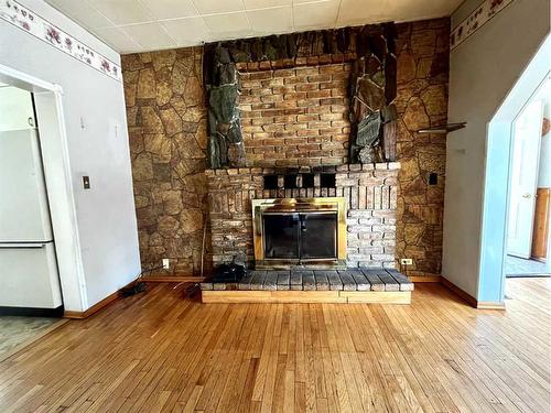 8202 15Th Avenue, Coleman, AB - Indoor With Fireplace