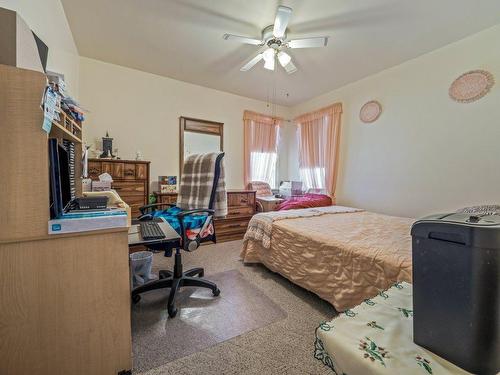 2015 7 Avenue South, Lethbridge, AB - Indoor Photo Showing Bedroom