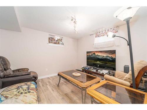 429 12 Street North, Lethbridge, AB - Indoor Photo Showing Living Room With Fireplace