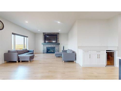 4725 40 Avenue S, Lethbridge, AB - Indoor Photo Showing Living Room With Fireplace