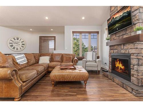 175 Sixmile Ridge South, Lethbridge, AB - Indoor Photo Showing Living Room With Fireplace