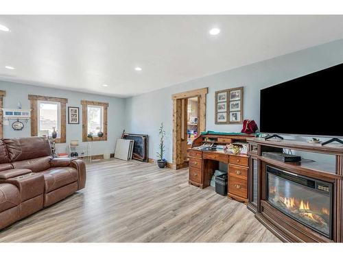 1516 15 Avenue North, Lethbridge, AB - Indoor Photo Showing Living Room With Fireplace