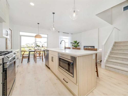 6 Blackwolf Pass North, Lethbridge, AB - Indoor Photo Showing Kitchen With Upgraded Kitchen