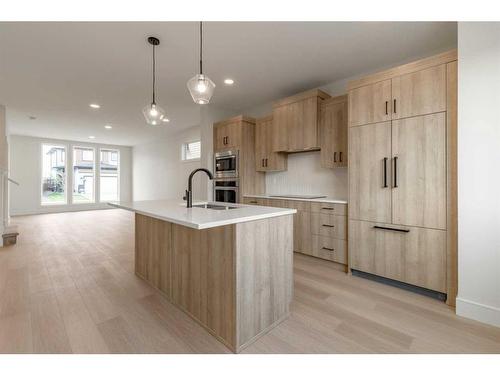 1139 Coalbrook Place West, Lethbridge, AB - Indoor Photo Showing Kitchen With Upgraded Kitchen