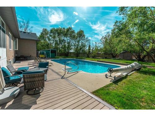 29 Huckleberry Crescent, Rural Taber, M.D. Of, AB - Outdoor With In Ground Pool With Deck Patio Veranda With Backyard