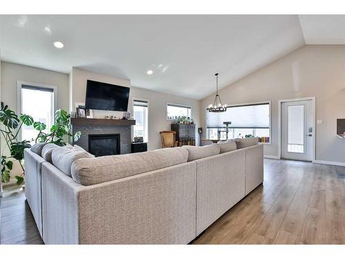 2724 46 Street South, Lethbridge, AB - Indoor Photo Showing Living Room With Fireplace