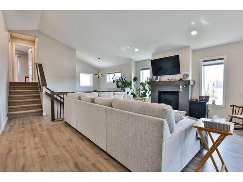 2724 46 Street South, Lethbridge, AB - Indoor Photo Showing Living Room With Fireplace