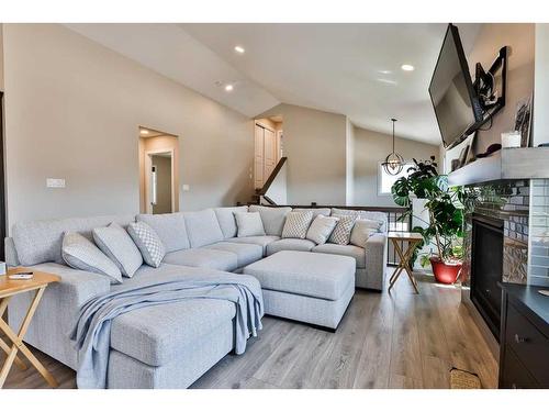 2724 46 Street South, Lethbridge, AB - Indoor Photo Showing Living Room With Fireplace