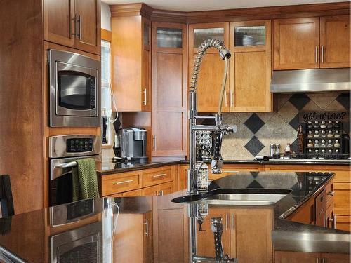 111 Tudor Crescent South, Lethbridge, AB - Indoor Photo Showing Kitchen With Double Sink