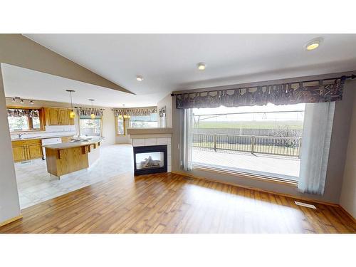 627 Maple Place, Picture Butte, AB - Indoor With Fireplace