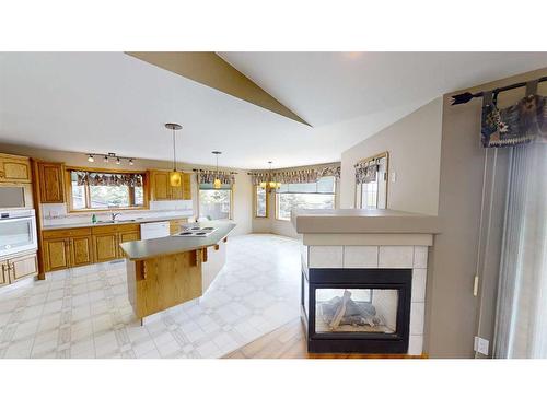 627 Maple Place, Picture Butte, AB - Indoor With Fireplace