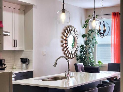 335 Aquitania Boulevard West, Lethbridge, AB - Indoor Photo Showing Kitchen With Double Sink