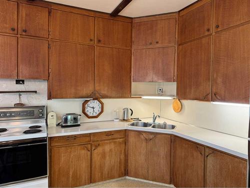 810 Schofield Street, Pincher Creek, AB - Indoor Photo Showing Kitchen With Double Sink