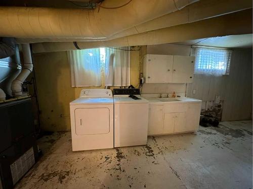 810 Schofield Street, Pincher Creek, AB - Indoor Photo Showing Laundry Room