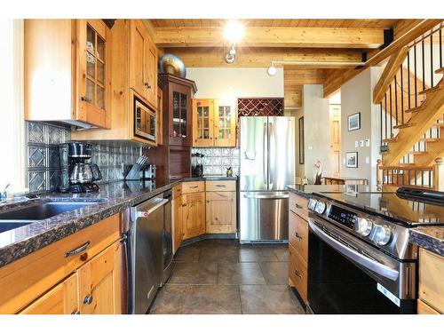 459 Sunset Drive, Rural Vulcan County, AB - Indoor Photo Showing Kitchen With Double Sink