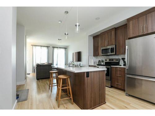 953 Miners Boulevard West, Lethbridge, AB - Indoor Photo Showing Kitchen With Upgraded Kitchen